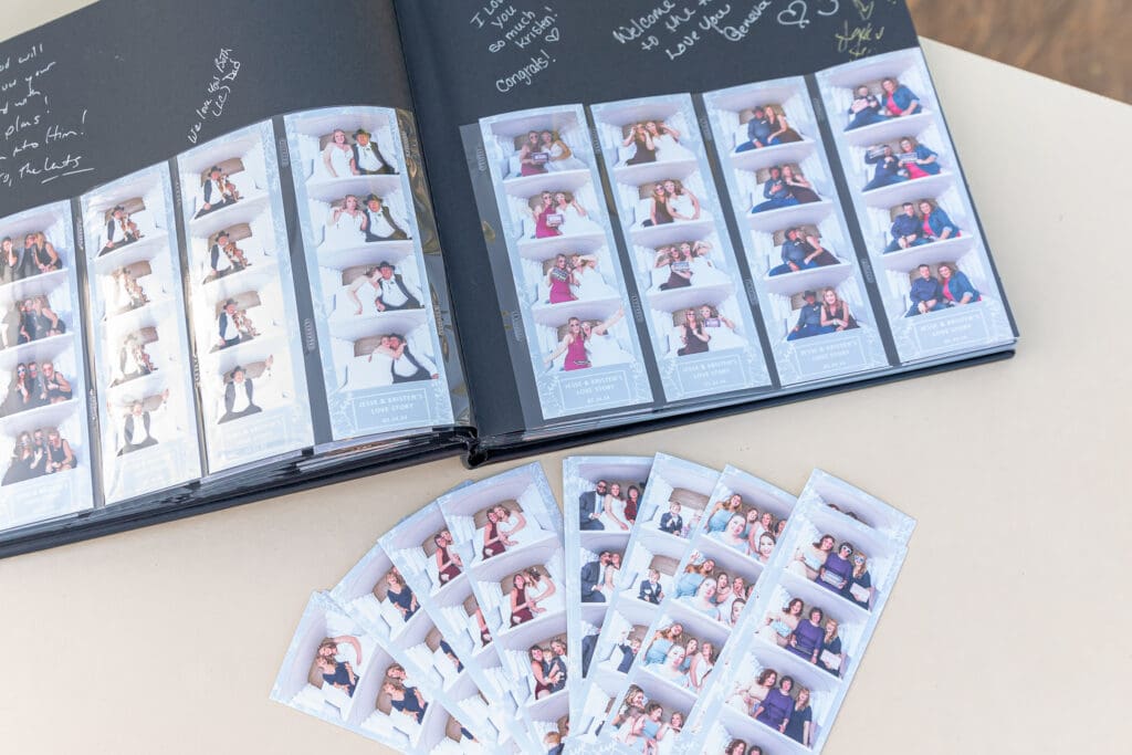 A Book full of photo strips and signed messages from wedding guests, at a Florida Wedding.