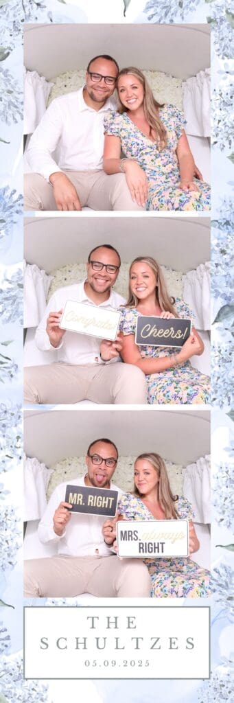 Guests posing inside Penny the Photo Bus at a Sarasota, Florida wedding