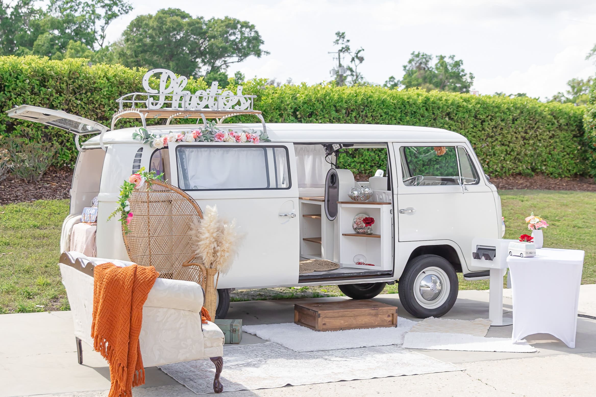 Vintage photo booth bus parked outside Florida wedding venue